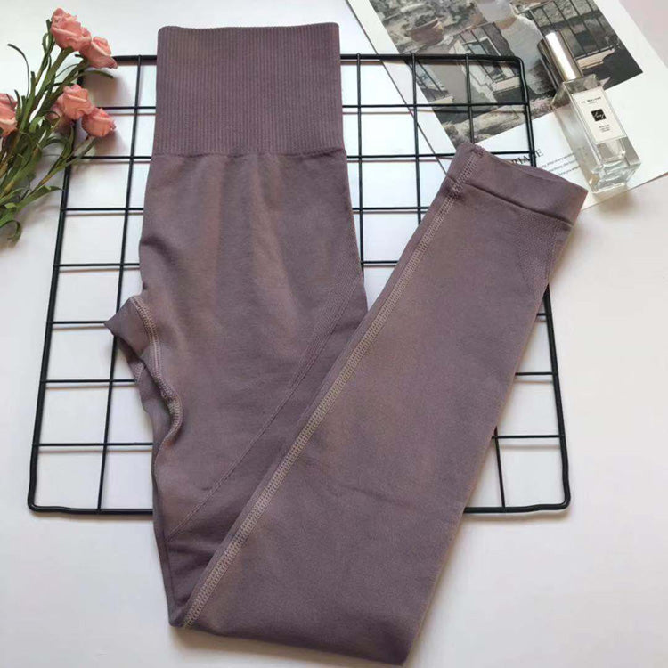 Mauve women's athletic set: high-waist leggings with ribbed waistband, soft breathable fabric.