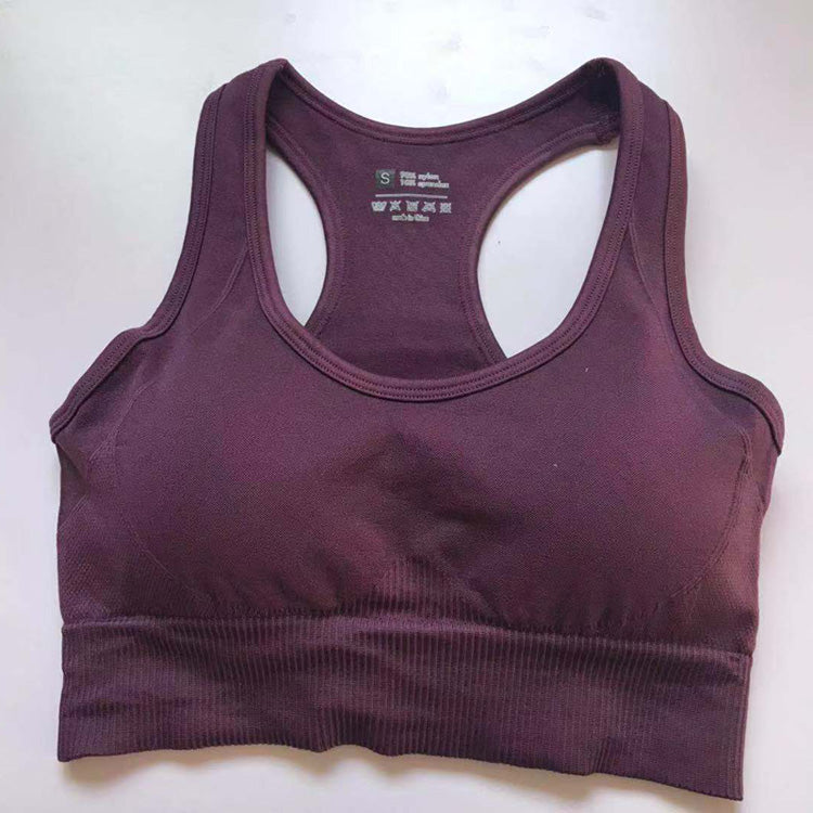 Purple racerback sports bra from a women's athletic set.