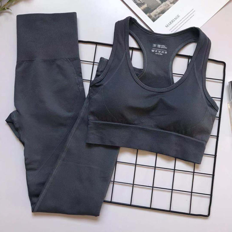 Dark gray women's athletic set with sports bra and high-waist leggings for comfort, support, and style.