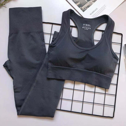 Dark gray women's athletic set with sports bra and high-waist leggings for comfort, support, and style.