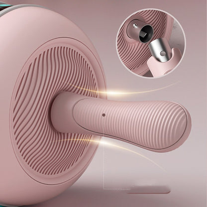 Pink Ab Wheel with LED light, USB charging, automatic rep counting, close-up handle and textured wheel.